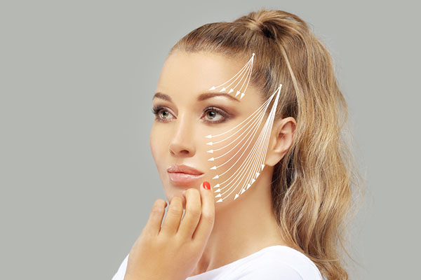 thread lift , nonsurgical procedure,lower facelift Gorgeous woman touching her lips